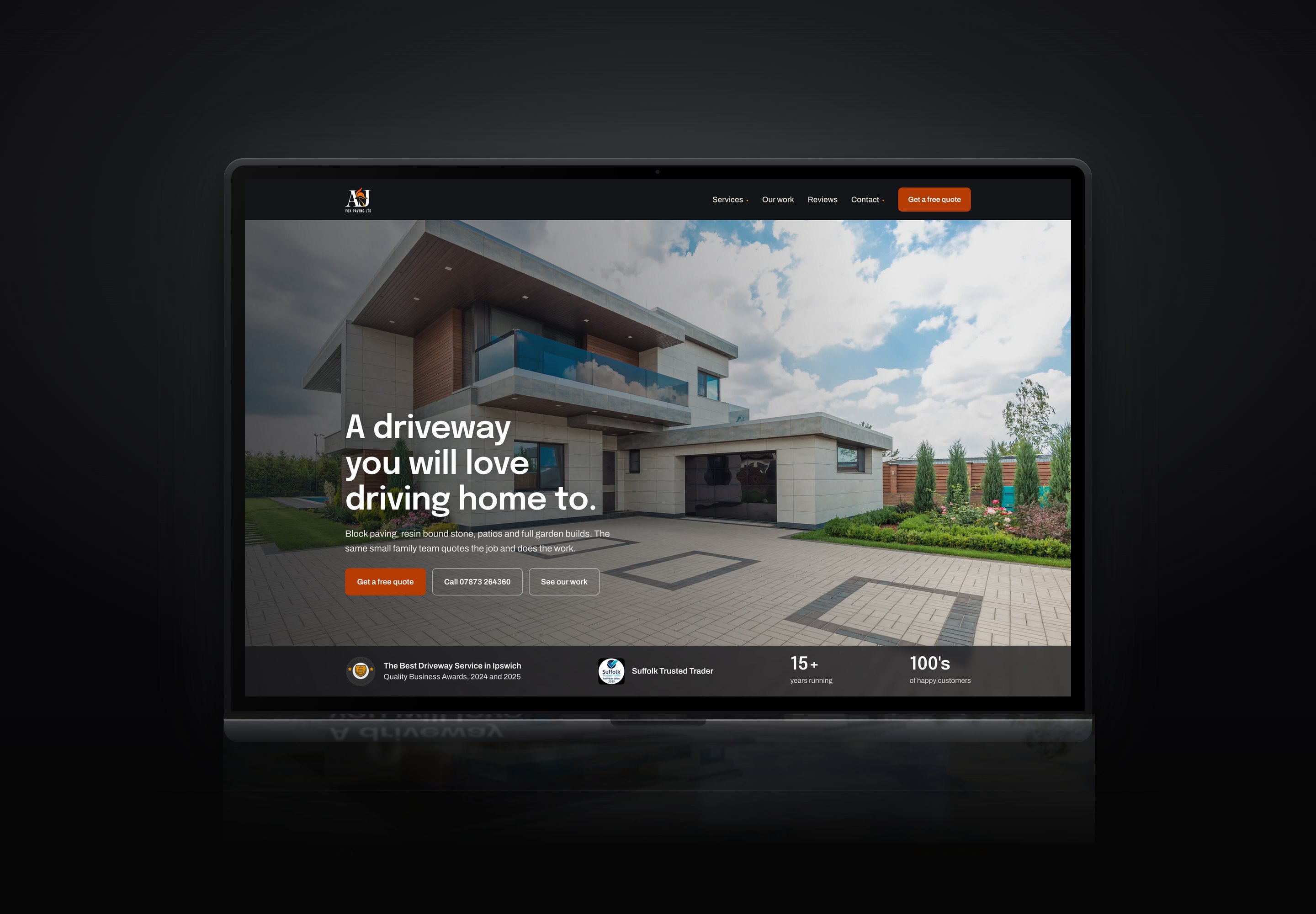 A&J Fox Paving website shown on a laptop
